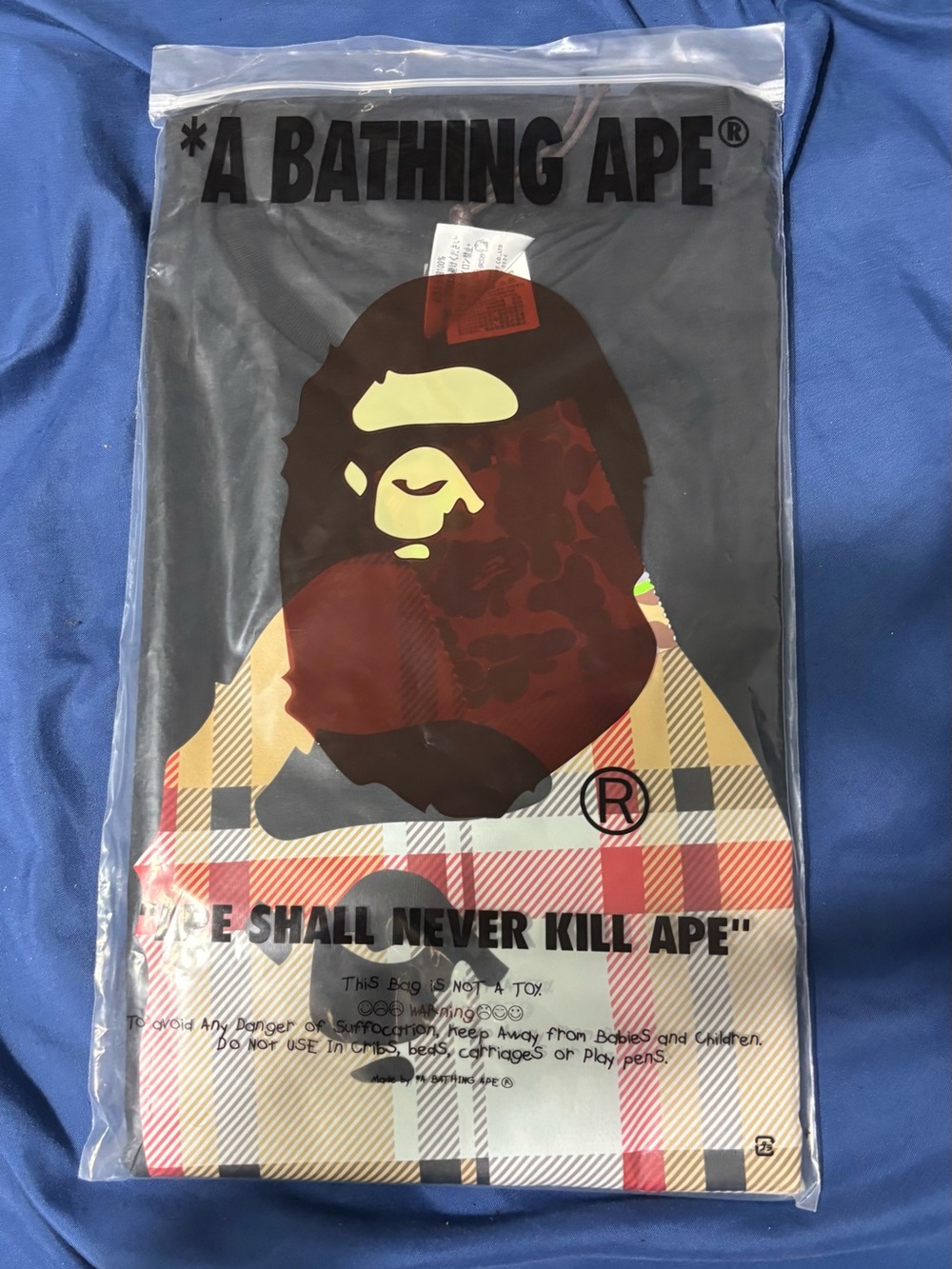 A Bathing Ape Short Sleeve Graphic Tee - Black with Multicolor Ape Motif